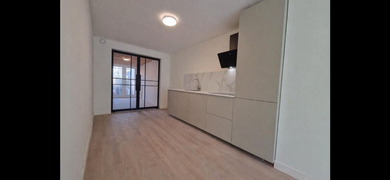 Ruim appartement met tuin in Ondiep - Afbeelding 1