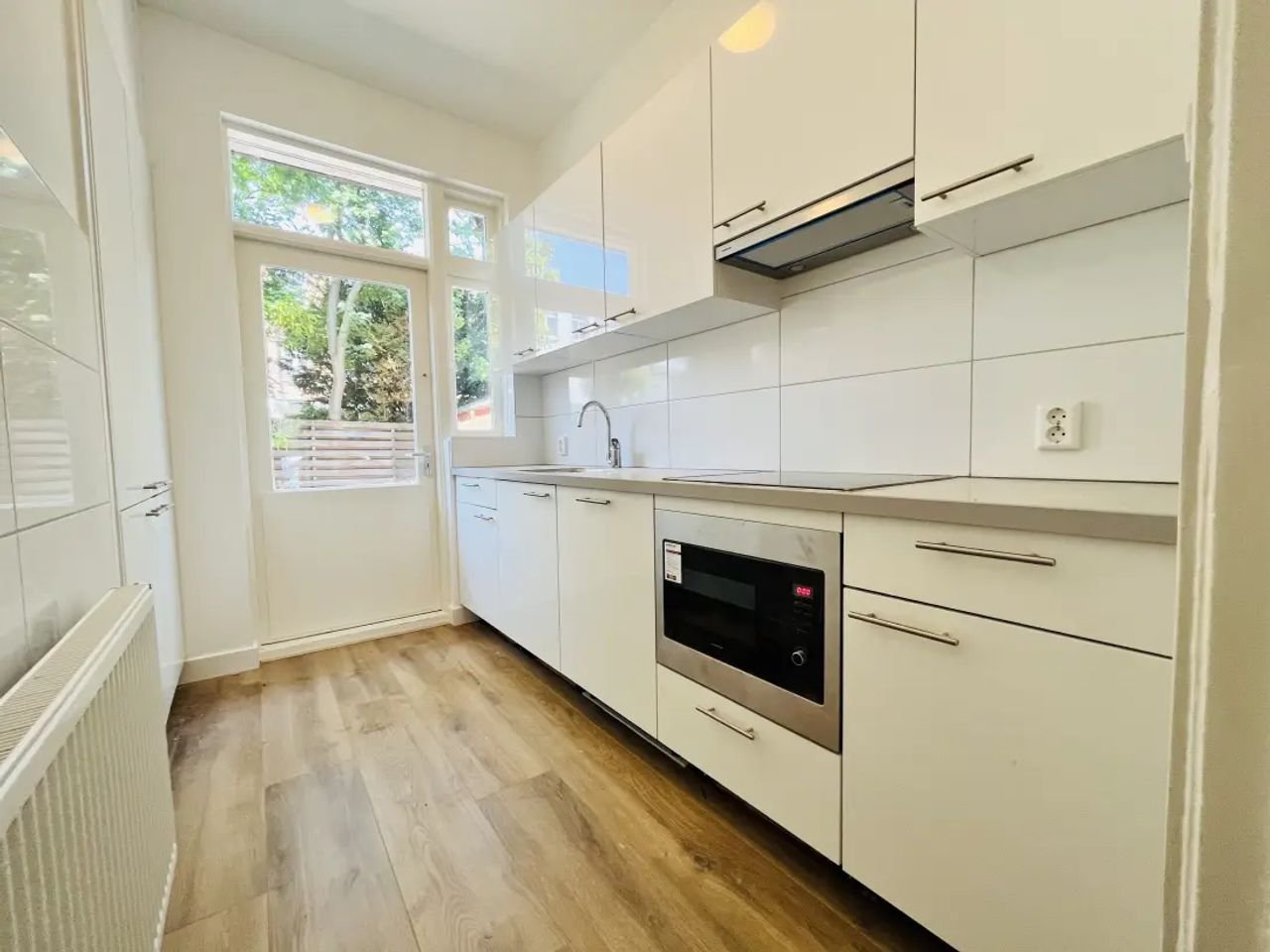 Begane grond appartement met eigen tuin - Afbeelding 4