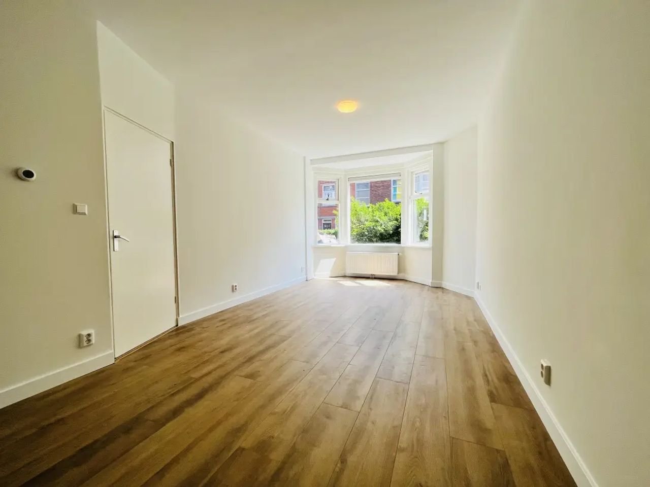 Begane grond appartement met eigen tuin - Afbeelding 1