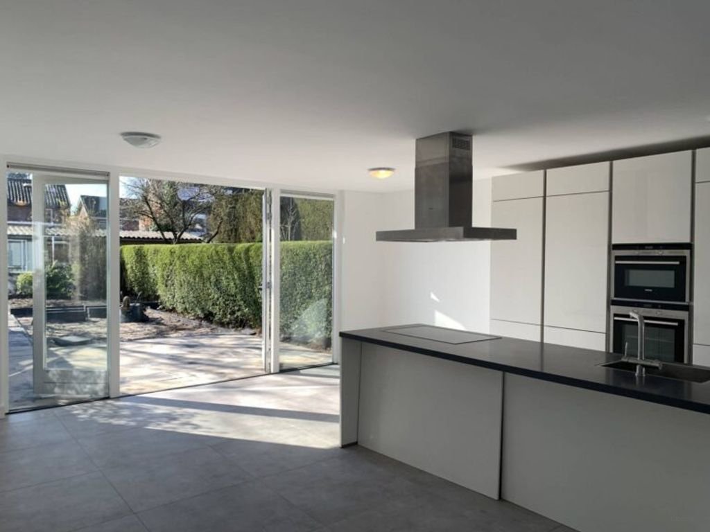 Gerenoveerd huis met diepe tuin - Afbeelding 2