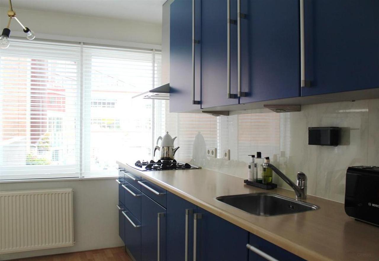 Bright 2-Bedroom Duplex with Balcony - Image 10