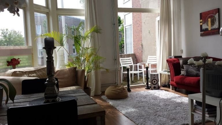 Licht appartement met twee balkons in Bezuidenhout - Afbeelding 2