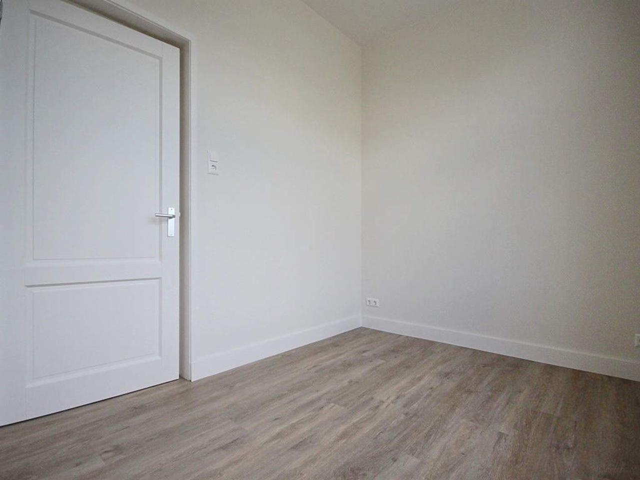 2-kamerappartement met grote gedeelde tuin - Afbeelding 11