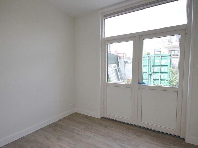2-kamerappartement met grote gedeelde tuin - Afbeelding 12