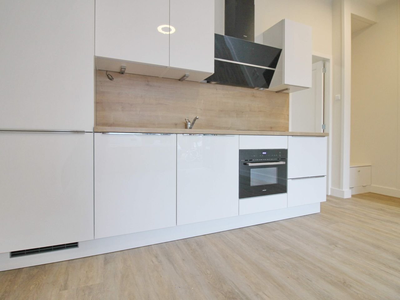 Licht benedenhuis met grote gedeelde tuin - Afbeelding 3