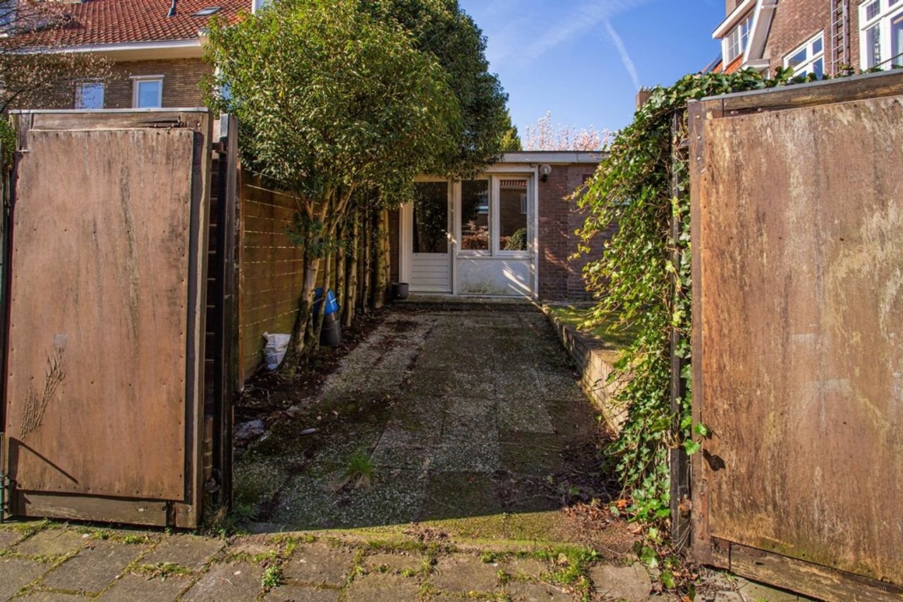 Jaren '30 benedenwoning met zonnige tuin - Afbeelding 23