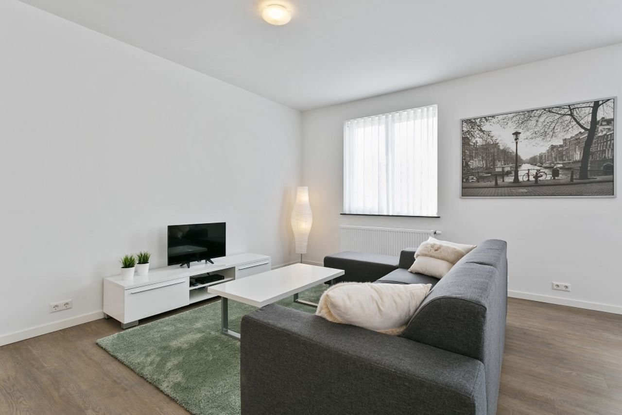 Renovated apartment with roof terrace in Schoot - Image 9