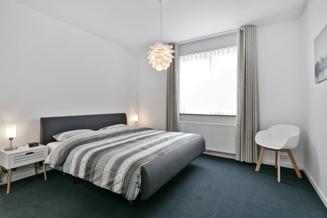 Renovated apartment with roof terrace in Schoot - Image 14