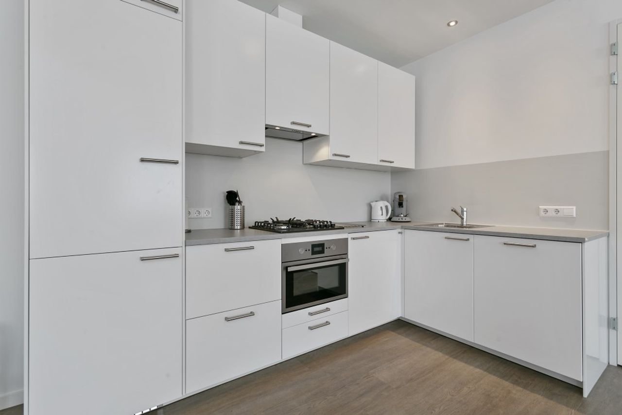 Renovated apartment with roof terrace in Schoot - Image 10