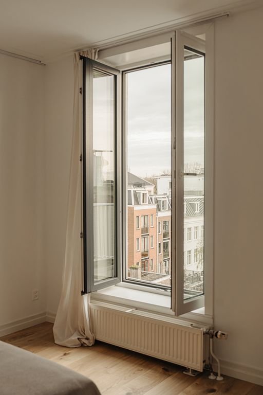 Licht bovenhuis van 119 m² in de Plantage - Afbeelding 32