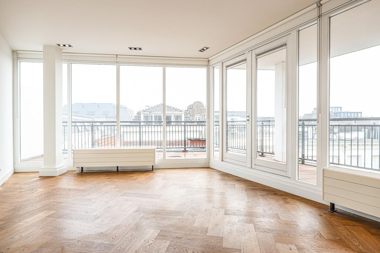 Licht 3-kamer appartement met balkon bij de Dam - Afbeelding 7