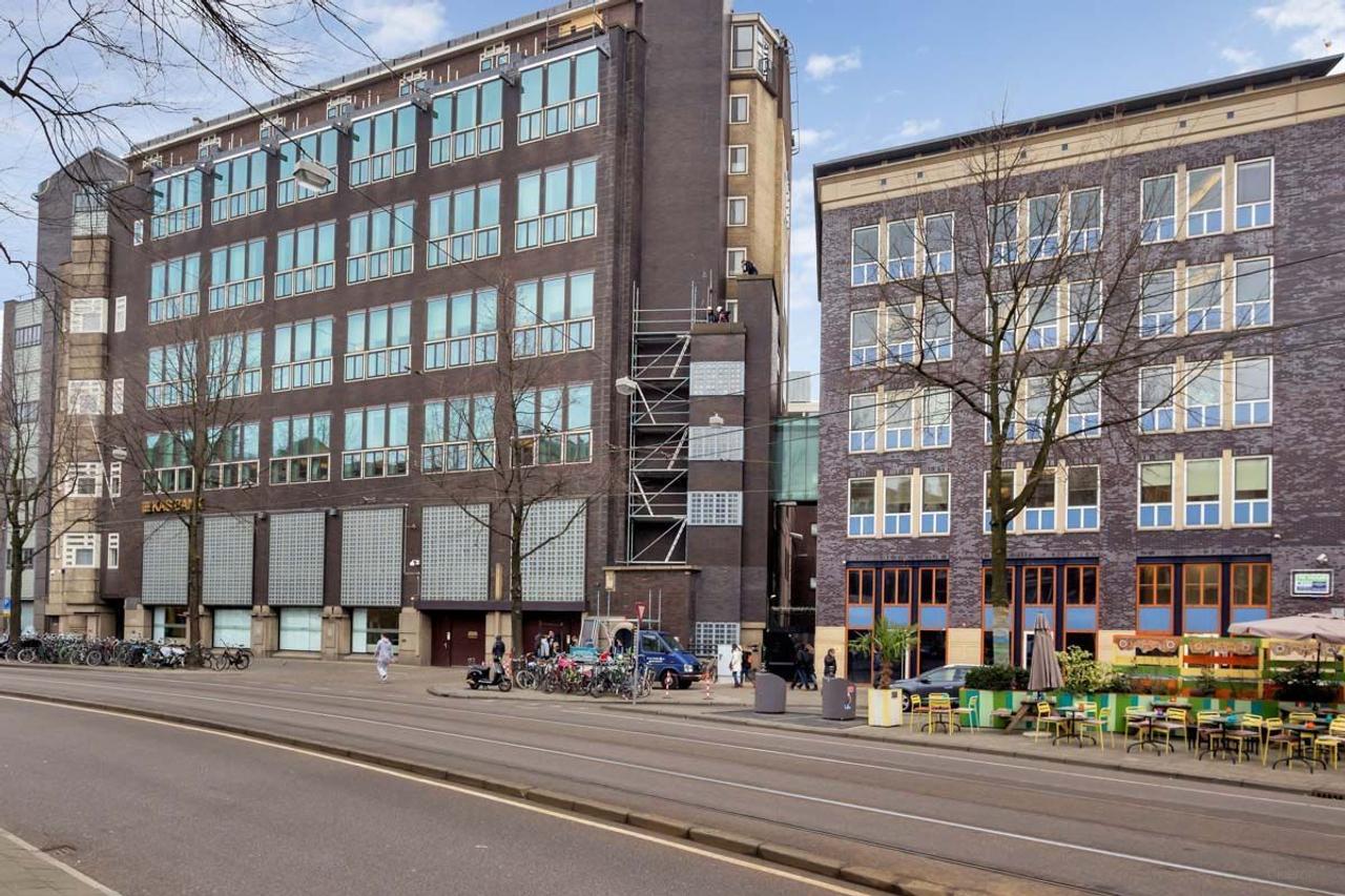 Licht 3-kamer appartement met balkon bij de Dam - Afbeelding 1