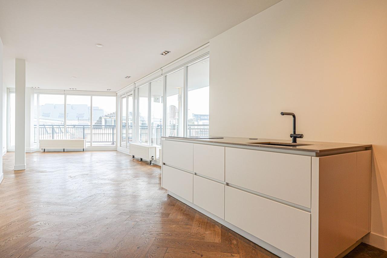 Licht 3-kamer appartement met balkon bij de Dam - Afbeelding 4