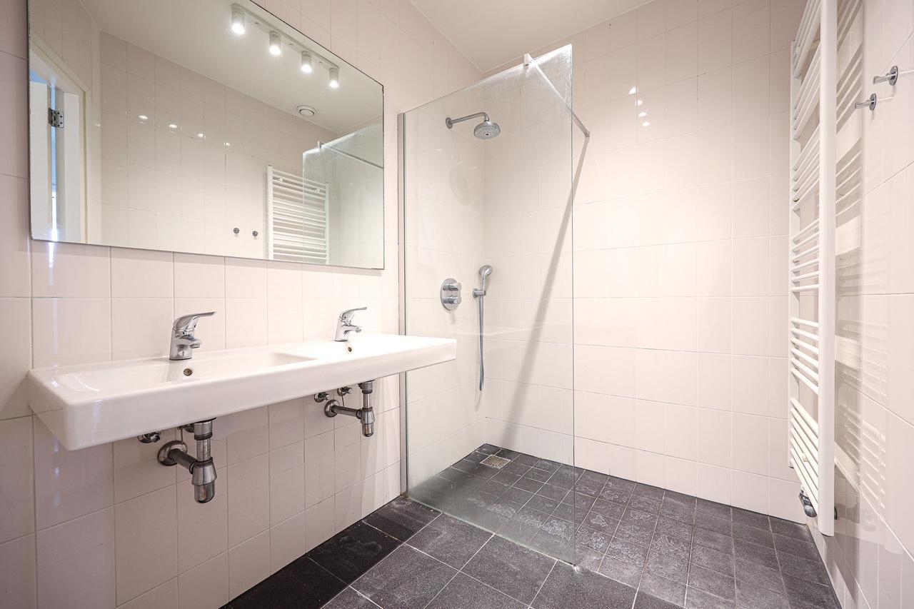 Licht 3-kamer appartement met balkon bij de Dam - Afbeelding 14