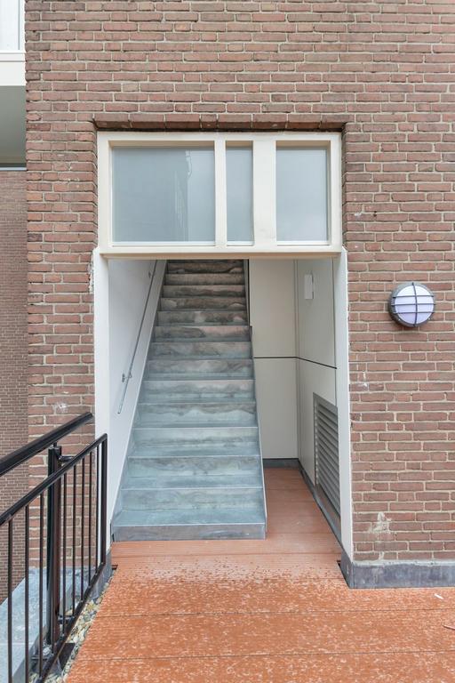 Licht 3-kamer appartement met balkon bij de Dam - Afbeelding 16