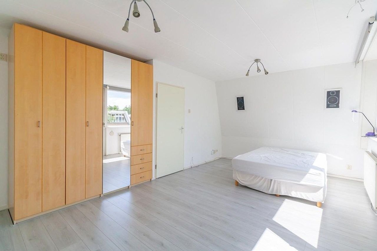 Hoekwoning van 185 m² met tuin en garage in Randwijck - Afbeelding 23