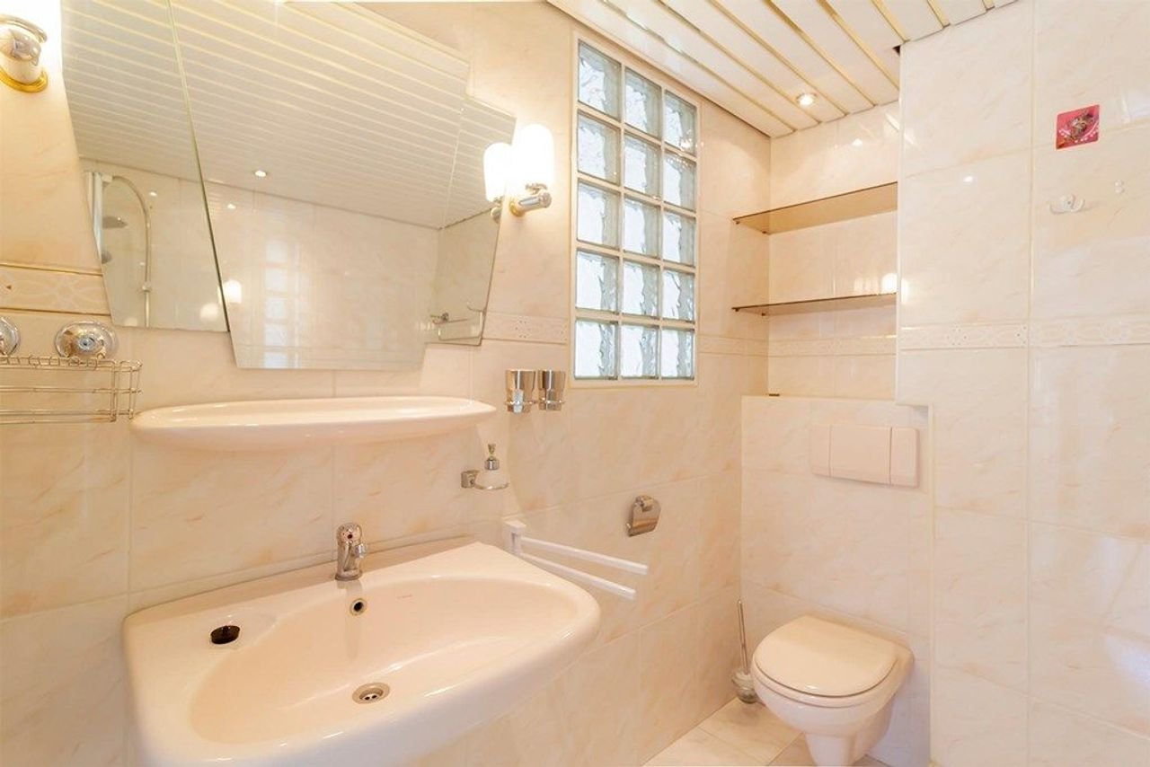 Hoekwoning van 185 m² met tuin en garage in Randwijck - Afbeelding 18