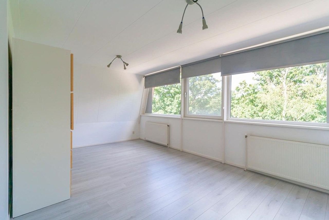 Hoekwoning van 185 m² met tuin en garage in Randwijck - Afbeelding 20