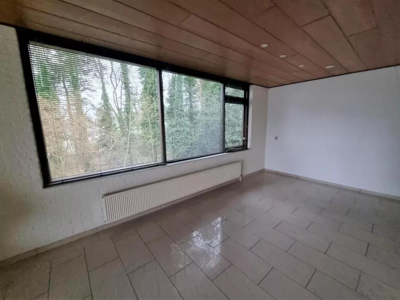 Bovenwoning met dakterras in Emmen - Afbeelding 11