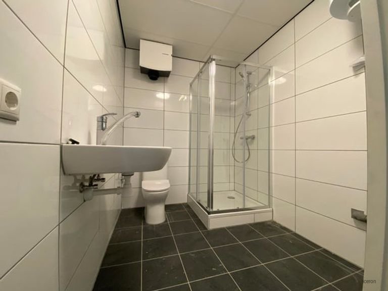 Gasloze woning van 68m2 in voormalig schoolgebouw - Afbeelding 11