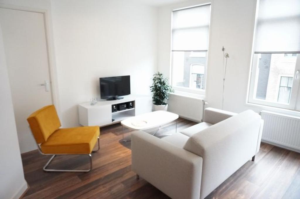 Licht 2-kamerappartement met balkon in de Jordaan - Afbeelding 2