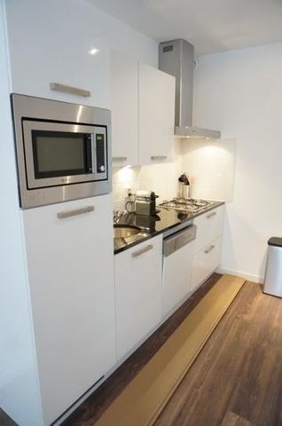 Licht 2-kamerappartement met balkon in de Jordaan - Afbeelding 6