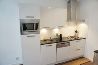 Licht 2-kamerappartement met balkon in de Jordaan - Afbeelding 7