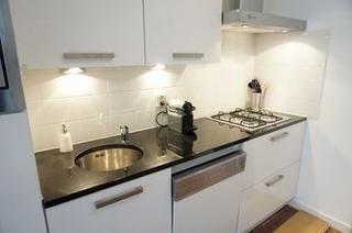 Licht 2-kamerappartement met balkon in de Jordaan - Afbeelding 9