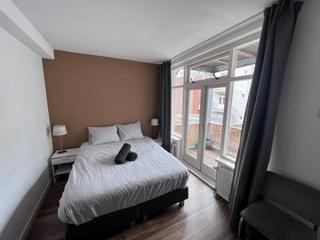 Licht 2-kamerappartement met balkon in de Jordaan - Afbeelding 11