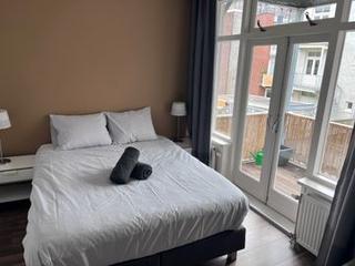Licht 2-kamerappartement met balkon in de Jordaan - Afbeelding 12