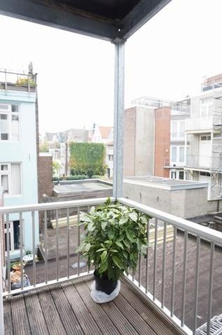 Licht 2-kamerappartement met balkon in de Jordaan - Afbeelding 16