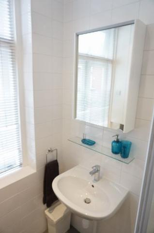 Licht 2-kamerappartement met balkon in de Jordaan - Afbeelding 19