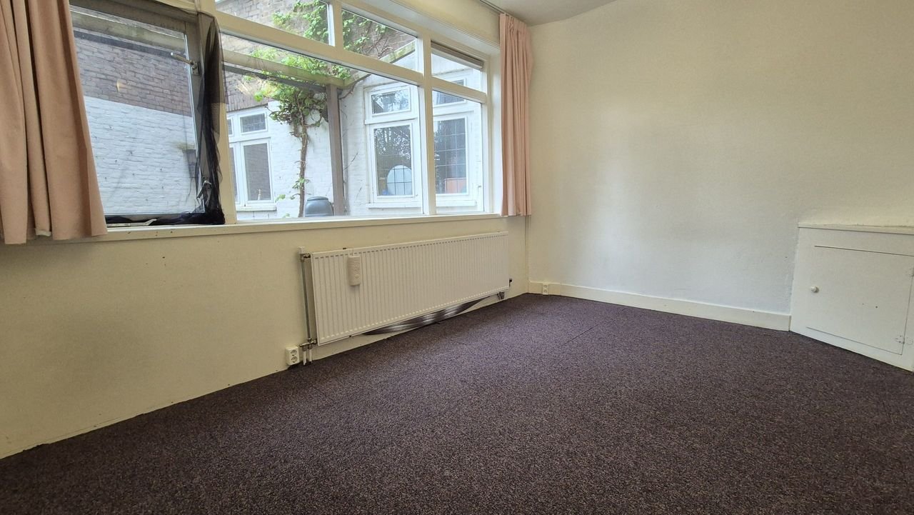 Jaren '30 benedenwoning met tuin in Blijdorp - Afbeelding 10