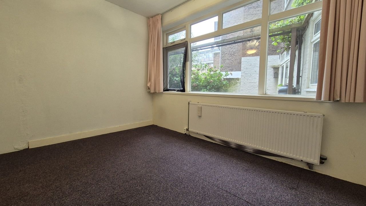 Jaren '30 benedenwoning met tuin in Blijdorp - Afbeelding 9