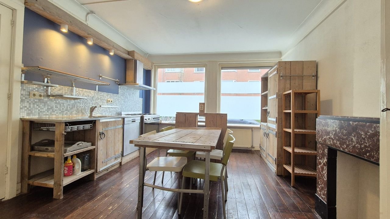 Jaren '30 benedenwoning met tuin in Blijdorp - Afbeelding 2