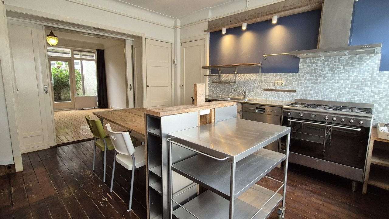 Jaren '30 benedenwoning met tuin in Blijdorp - Afbeelding 1