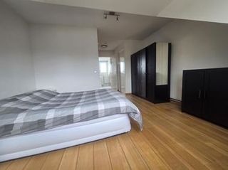 Gemeubileerd appartement met houten vloer in Brusselsepoort - Afbeelding 9