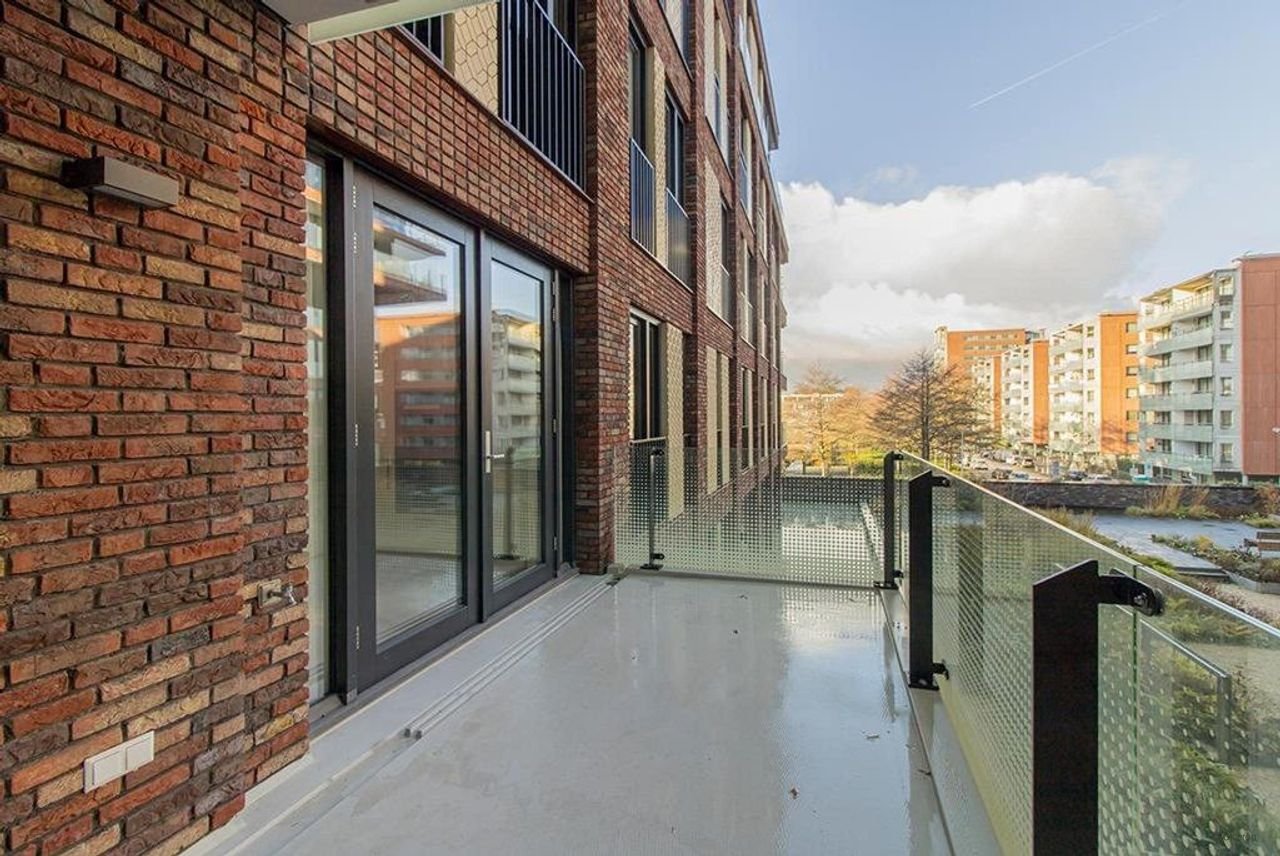 Licht appartement van 145 m² met kookeiland - Afbeelding 13