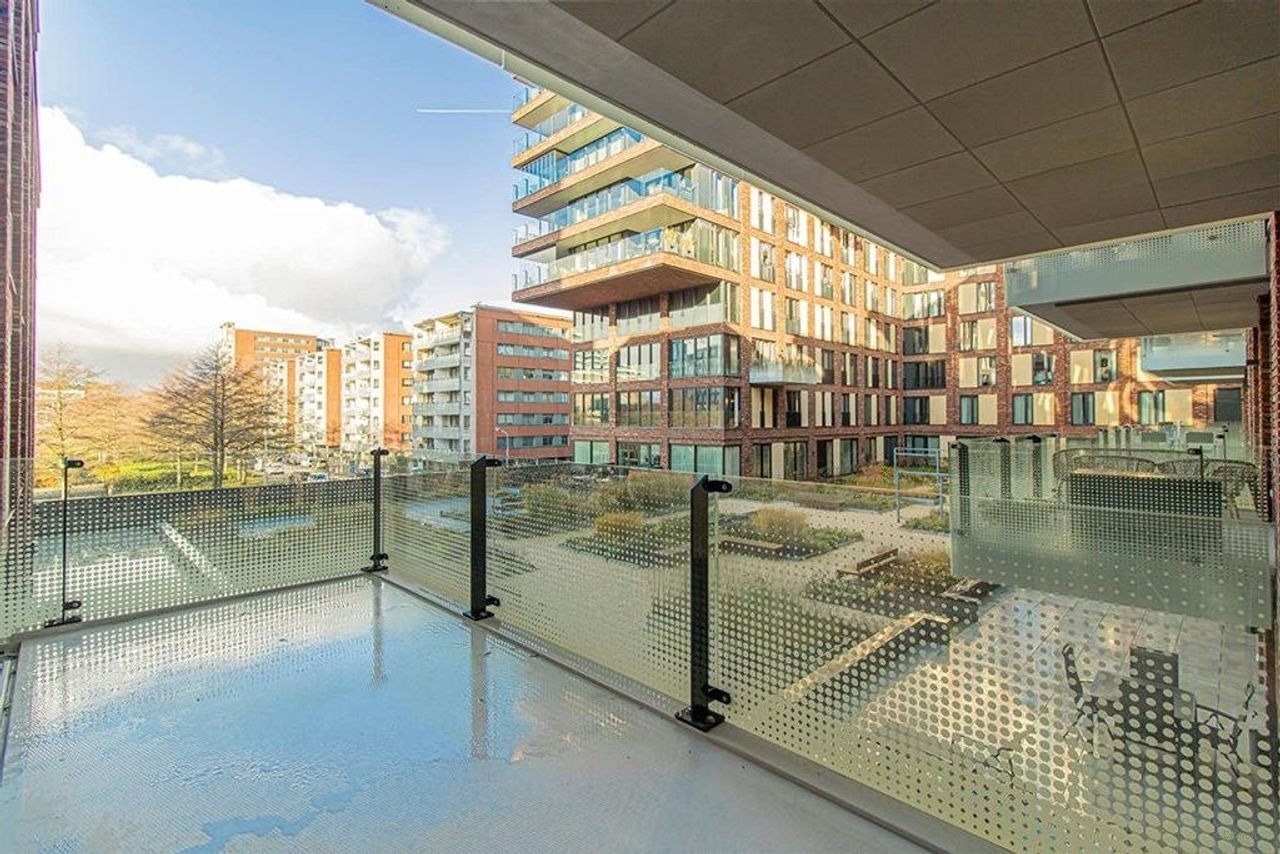 Licht appartement van 145 m² met kookeiland - Afbeelding 12