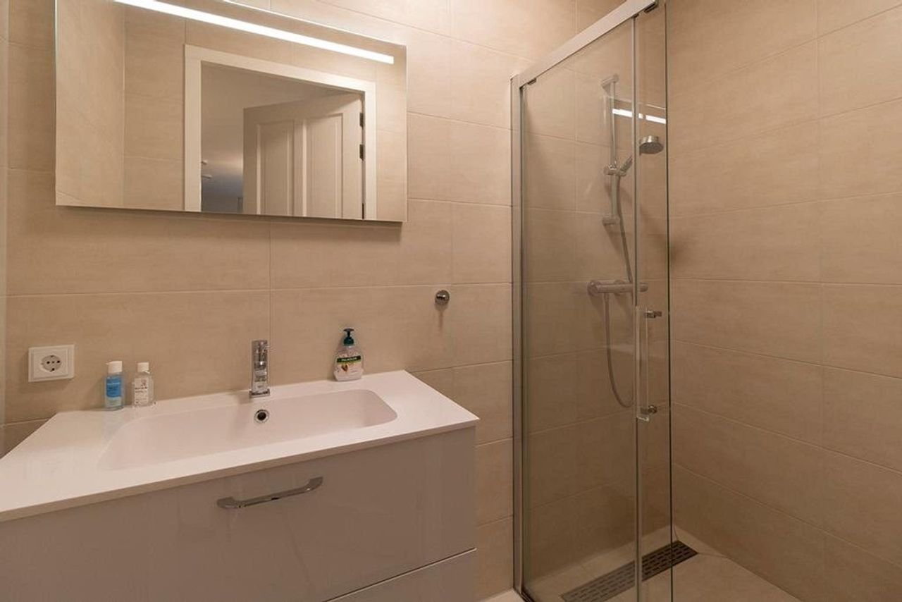 Licht appartement van 145 m² met kookeiland - Afbeelding 23