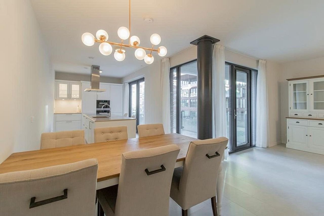 Licht appartement van 145 m² met kookeiland - Afbeelding 9