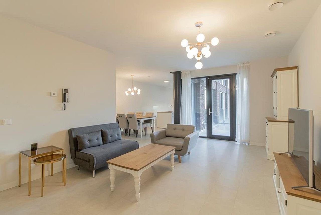 Licht appartement van 145 m² met kookeiland - Afbeelding 5
