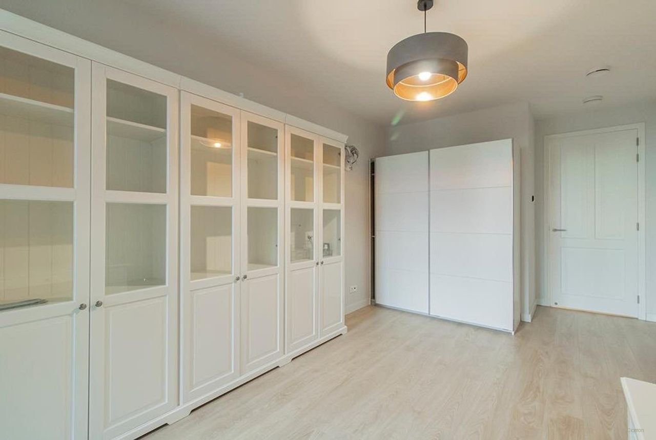 Licht appartement van 145 m² met kookeiland - Afbeelding 22