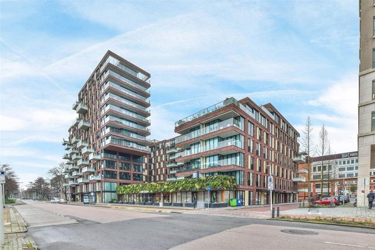 Licht appartement van 145 m² met kookeiland - Afbeelding 1