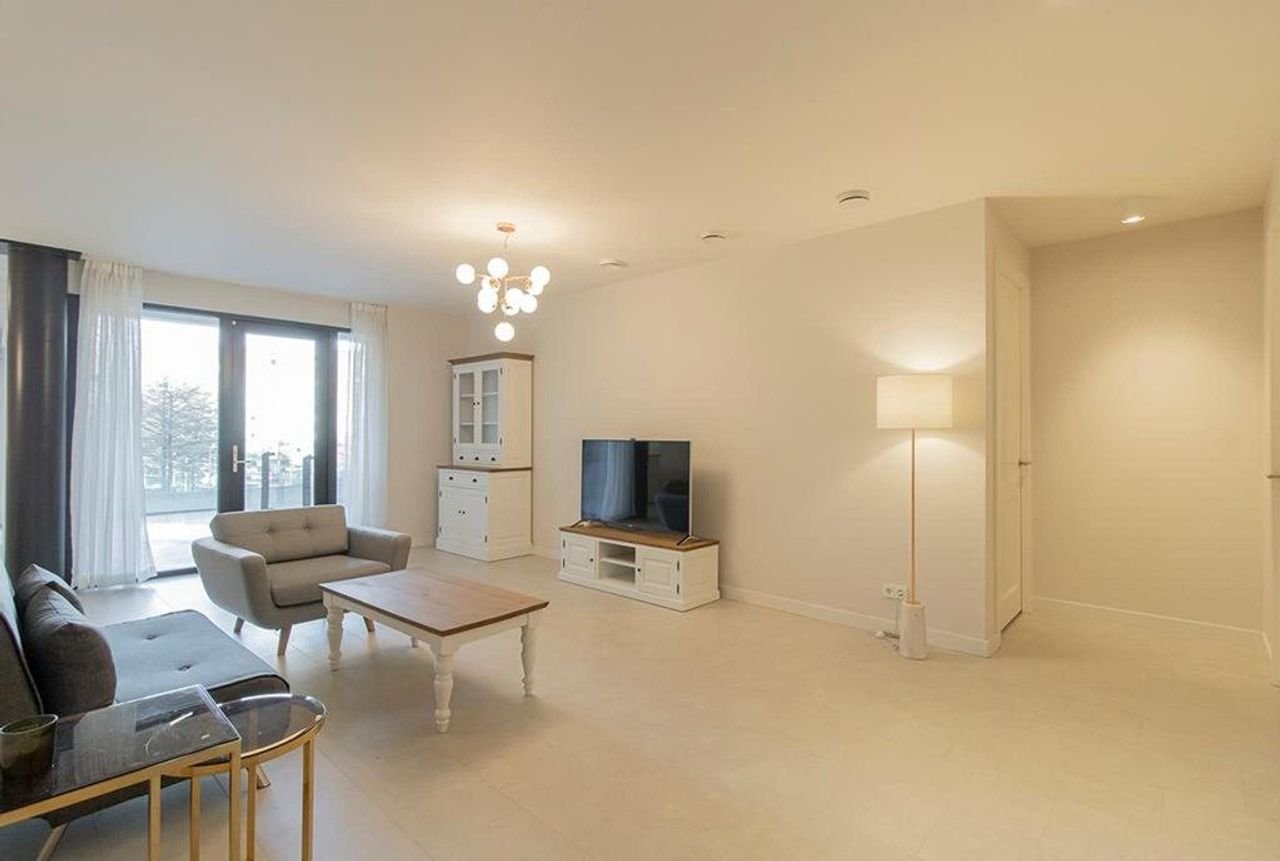 Licht appartement van 145 m² met kookeiland - Afbeelding 4