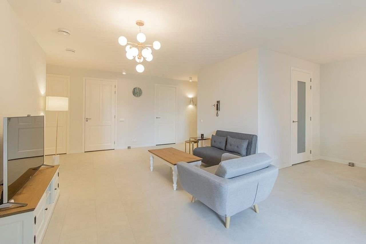 Licht appartement van 145 m² met kookeiland - Afbeelding 7