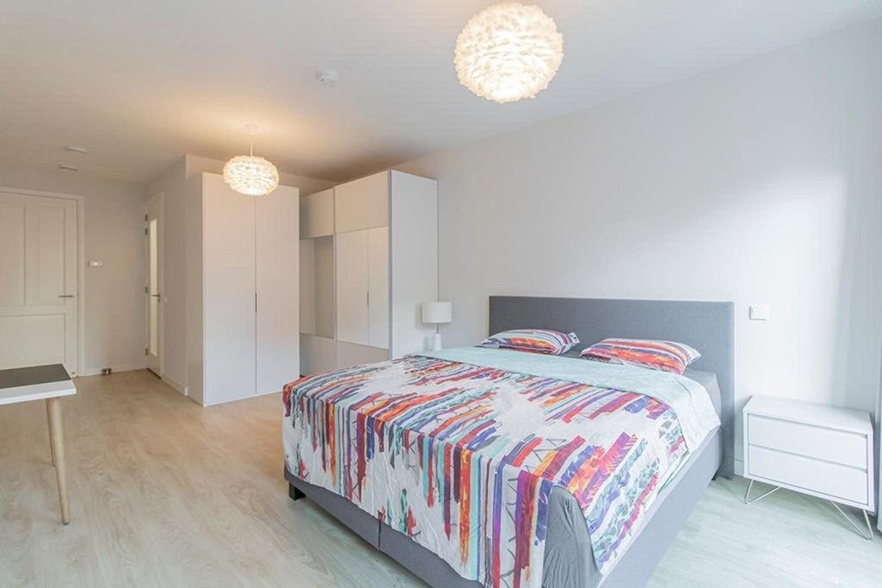 Licht appartement van 145 m² met kookeiland - Afbeelding 17