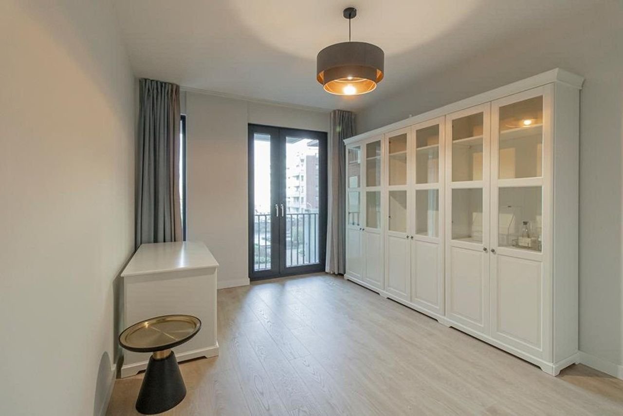 Licht appartement van 145 m² met kookeiland - Afbeelding 21