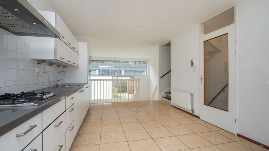 Huis (146m²) met tuin en parkeerplek in Geuzenveld - Afbeelding 2