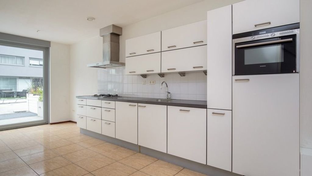 Huis (146m²) met tuin en parkeerplek in Geuzenveld - Afbeelding 3